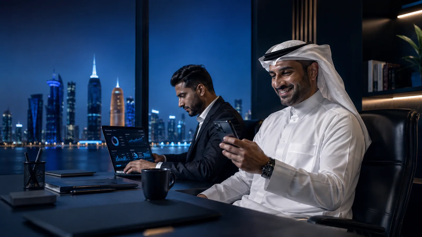 Qatar business owner reviewing digital marketing results with AWUS DIGITAL